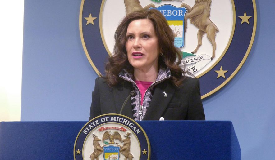 Mich. Gov. Gretchen Whitmer speaks at a news conference on Friday, March 11, 2022, at the governor&#39;s office in Lansing, Mich. (AP Photo/David Eggert/File)