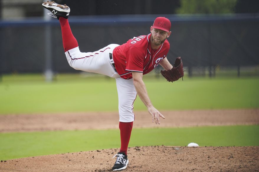 Washington Nationals pitcher Stephen Strasburg throws live batting practice during the team&#39;s spring training baseball workout, Tuesday, March 15, 2022, in West Palm Beach, Fla. (AP Photo/Sue Ogrocki) **FILE**