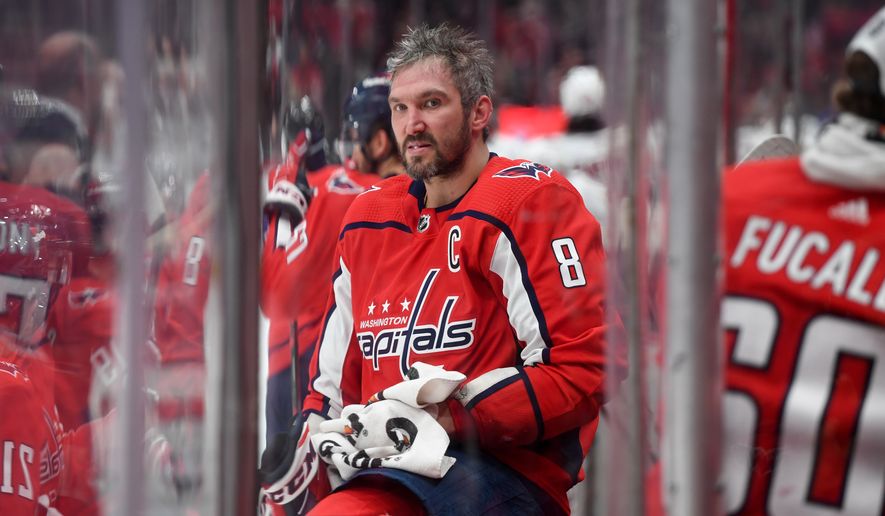 Washington Capitals Left Wing Alex Ovechkin (8) on bench during a break in the action during the 2nd period against the Carolina Hurricanes at Capital One Arena in Washington D.C., March 3, 2022. (Photo by All-Pro Reels)