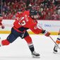 Washington Capitals Right Wing Tom Wilson (43) taking shot during the 3rd period against the New York Islanders at Capital One Arena in Washington D.C., March 15, 2022. (Photo by All-Pro Reels)