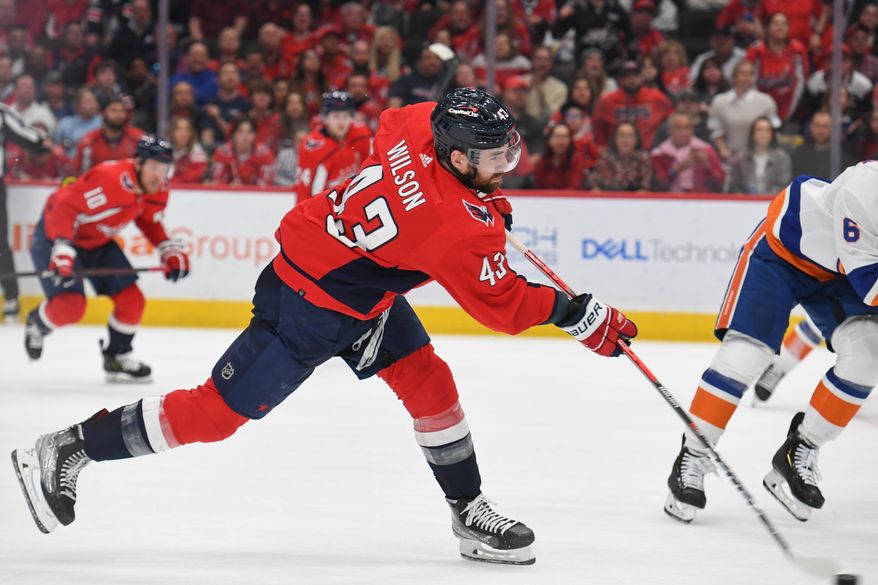 Washington Capitals Right Wing Tom Wilson (43) taking shot during the 3rd period against the New York Islanders at Capital One Arena in Washington D.C., March 15, 2022. (Photo by All-Pro Reels)