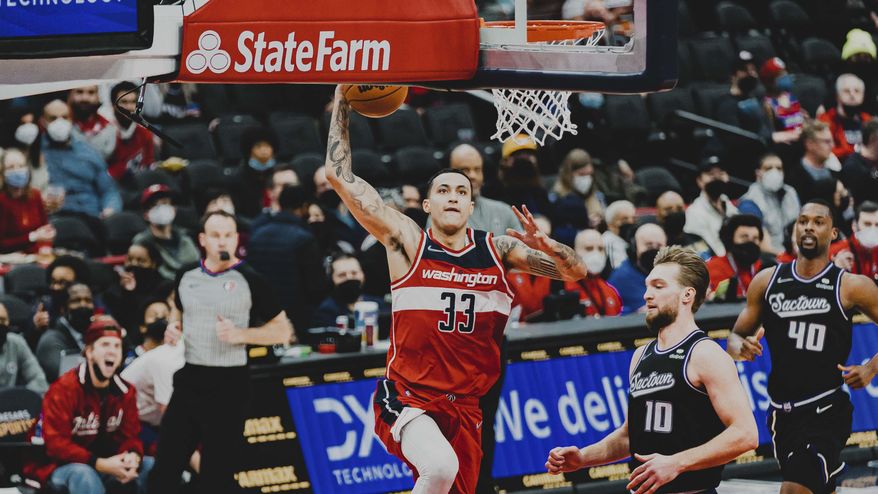 Washington Wizard Kyle Kuzma lays up a shot against the Sacramento Kings at the Capital One Arena in Washington D.C., Feb. 12, 2022. (Photo by All-Pro Reels)