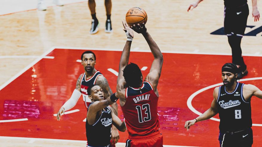 Washington Wizard Thomas Bryant takes a three point shot against the Sacramento Kings at the Capital One Arena in Washington D.C., Feb. 12, 2022. (Photo by All-Pro Reels)