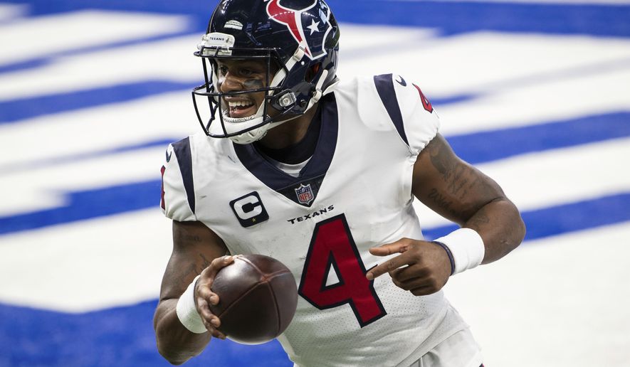 Houston Texans quarterback Deshaun Watson (4) celebrates a touchdown during the team&#39;s NFL football game against the Indianapolis Colts on Dec. 20, 2020, in Indianapolis. Several teams are scrambling to find a quarterback. Some of those, including Carolina, New Orleans and Cleveland, have been in discussions with Watson, who sat out last season. (AP Photo/Zach Bolinger, File)