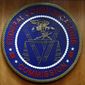 The seal of the Federal Communications Commission (FCC) is seen before an FCC meeting to vote on net neutrality in Washington on Dec. 14, 2017.  Washington has expelled another state-owned Chinese phone carrier from the U.S. market over national security concerns amid rising tension with Beijing. (AP Photo/Jacquelyn Martin, File)