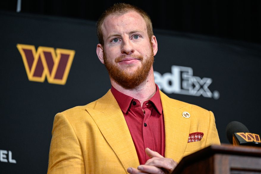 Washington Commanders quarterback Carson Wentz speaks with reporters during his introductory press conference at Inova Sports Performance Center in Ashburn, Va., March 17, 2022. (Photo by Brian Murphy, All-Pro Reels)