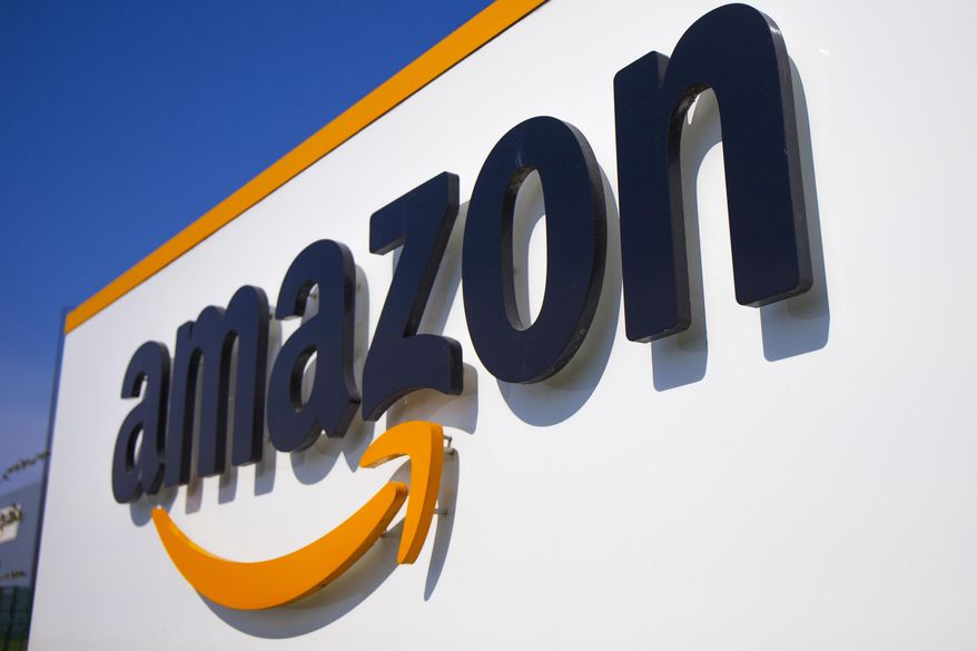 This April 16, 2020 shows the Amazon logo in Douai, northern France. (AP Photo/Michel Spingler, File)