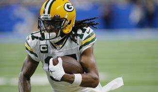 Green Bay Packers wide receiver Davante Adams runs during the first half of the team&#39;s NFL football game against the Detroit Lions on Jan. 9, 2022, in Detroit. The Las Vegas Raiders have traded two draft picks to Green Bay for All-Pro receiver Adams. A person familiar with the move said Thursday, March 17, the Raiders are sending the No. 22 overall pick in April&#39;s draft and another draft pick to the Packers to reunited Adams with his college quarterback Derek Carr. The person spoke on condition of anonymity because the deal hadn&#39;t been announced. (AP Photo/Duane Burleson, File) **FILE**