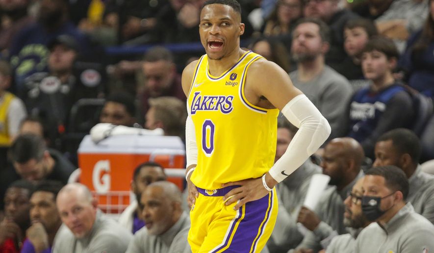 Los Angeles Lakers guard Russell Westbrook yells during an NBA basketball game against the Minnesota Timberwolves Wednesday, March 16, 2022, in Minneapolis. (AP Photo/Andy Clayton-King)