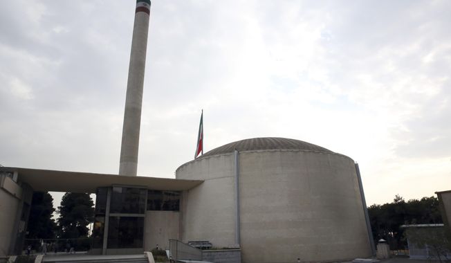This Sept. 1, 2014 file photo, shows a nuclear research reactor at the headquarters of the Atomic Energy Organization of Iran, which went online with American help in 1967 - before Iran&#x27;s 1979 Islamic Revolution strained ties between the two countries, in Tehran, Iran has converted a fraction of its stockpile of highly enriched uranium into material that can detect cancers and other diseases. That&#x27;s according to the United Nations’ nuclear watchdog and an Iranian media report on Friday, March 18, 2022. (AP Photo/Vahid Salemi, File)