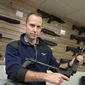 Adrian Kellgren, director of industrial production of KelTec, holds a 9mm SUB2000 rifle, similar to ones being shipped to Ukraine, at their manufacturing facility on Thursday, March 17, 2022, in Cocoa, Fla. Kellgren’s family-owned gun company was left holding a $200,000 shipment of semi-automatic rifles after a longtime customer in Odessa suddenly went silent during Vladimir Putin’s invasion of Ukraine. Fearing the worst, the company decided to put those stranded 400 guns to good use, sending them to Ukraine&#39;s nascent resistance movement. (AP Photo/Phelan M. Ebenhack)