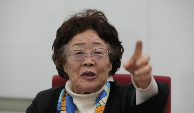Lee Yong-soo, a South Korean sexual slavery survivor who has been demanding since the early 1990s that the Japanese government fully accept culpability and offer an unequivocal apology, speaks during an interview in Seoul, South Korea, Wednesday, March 16, 2022. (AP Photo/Lee Jin-man) ** FILE **