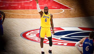 LeBron James salutes the crowd as they congratulate him for passing Karl Malone on the NBA all-time scoring list. From Washington Wizards vs. Los Angeles Lakers at Capital One Arena, March 19th, 2022 (Joe Glorioso | Washington Times Sports)