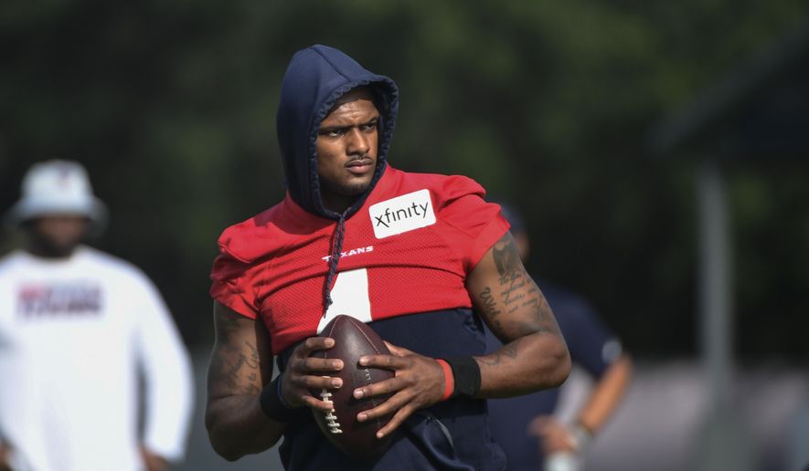 Texans quarterback Deshaun Watson (4) practices with the team during NFL football practice, Aug. 2, 2021, in Houston. Watson&#39;s complicated past didn&#39;t dissuade the Cleveland Browns from betting on the quarterback&#39;s future. He&#39;s on Cleveland&#39;s roster, and at this point that&#39;s the only certainty with the talented yet controversial QB. Watson&#39;s stunning trade to the Browns became official Sunday, March 20, 2022 capping a whirlwind few days during in which the three-time Pro Bowler — accused by 22 women of sexual harassment or assault — agreed to come to Cleveland after initially telling the team he wouldn&#39;t. (AP Photo/Justin Rex) **FILE**