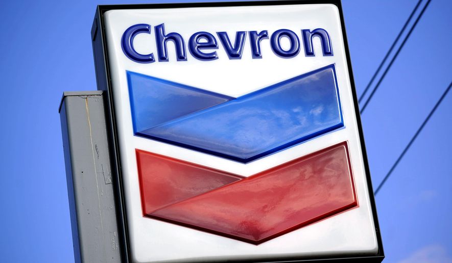 A Chevron sign is displayed outside one of the company&#39;s gas stations in Bradenton, Fla., on Tuesday, Feb. 22, 2022. (AP Photo/Gene J. Puskar) **FILE**