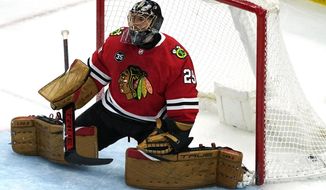 Chicago Blackhawks goaltender Marc-Andre Fleury reacts after Winnipeg Jets left wing Nikolaj Ehlers scored a goal during the first period of an NHL hockey game in Chicago, Sunday, March 20, 2022. (AP Photo/Nam Y. Huh) **FILE**