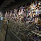 Photos of people who died in the Sept. 11, 2001, World Trade Center attacks are displayed at the 9/11 Tribute Museum, in New York, Monday, March 21, 2022. (AP Photo/Richard Drew) ** FILE **