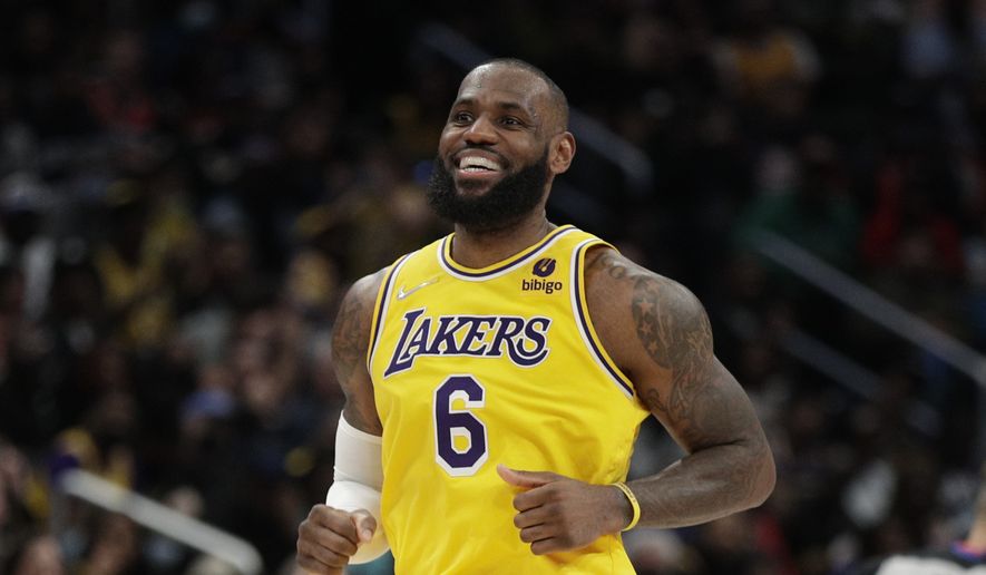 Los Angeles Lakers&#39; LeBron James is seen during the second half of an NBA basketball game against the Washington Wizards, Saturday, March 19, 2022, in Washington. (AP Photo/Luis M. Alvarez)