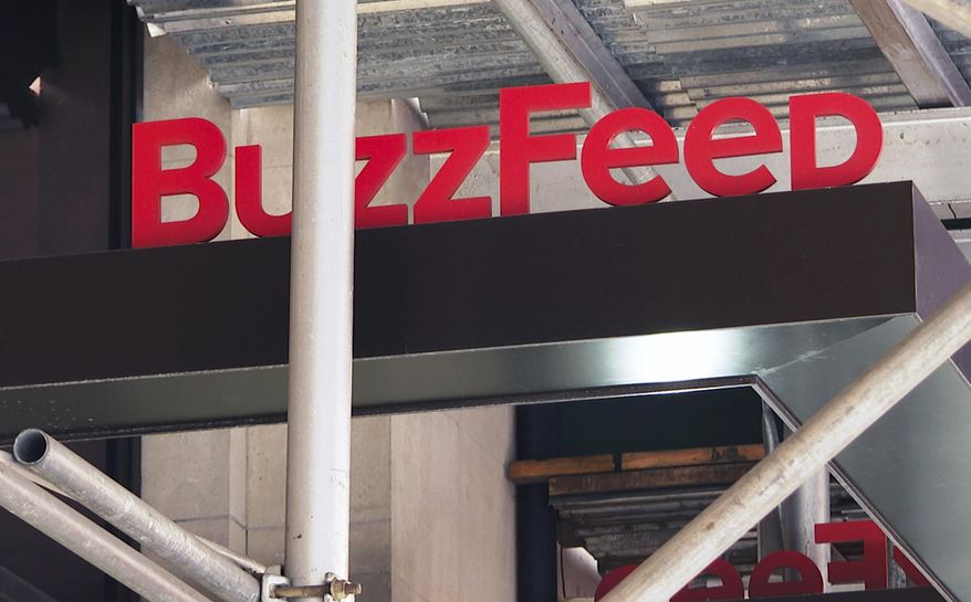 The entrance to BuzzFeed in New York is seen on Nov. 19, 2020. In news announced Tuesday, March 22, 2022, BuzzFeed is reorienting and shrinking its news division as the digital media company best known for its lighthearted quizzes strives to increase its profitability. (AP Photo/Ted Shaffrey, File)