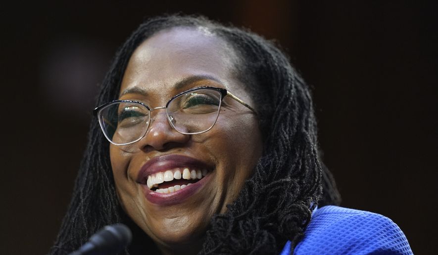 Supreme Court nominee Ketanji Brown Jackson laughs as she is questioned by Sen. Alex Padilla, D-Calif., during her confirmation hearing before the Senate Judiciary Committee on Capitol Hill in Washington, Wednesday, March 23, 2022. (AP Photo/Alex Brandon)