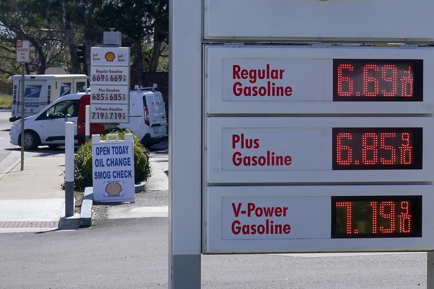The gasoline price board is shown at a gas station in Menlo Park, Calif., on March 21, 2022. (AP Photo/Jeff Chiu, File)