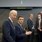 U.S. President Joe Biden, left, speaks with French President Emmanuel Macron during a round table meeting during an extraordinary NATO summit at NATO headquarters in Brussels, Thursday, March 24, 2022. As the war in Ukraine grinds into a second month, President Joe Biden and Western allies are gathering to chart a path to ramp up pressure on Russian President Vladimir Putin while tending to the economic and security fallout that&#39;s spreading across Europe and the world. (AP Photo/Markus Schreiber)