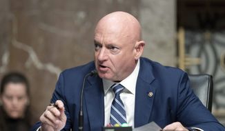 Sen. Mark Kelly, D-Ariz., speaks during a hearing of the Senate Armed Services Committee to examine the posture of United States Northern Command and United States Southern Command, on Capitol Hill, in Washington, Thursday, March 24, 2022. (AP Photo/Jose Luis Magana) ** FILE **