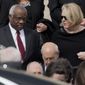 Supreme Court Associate Justice Clarence Thomas, left and his wife Virginia Thomas, right, leave the Basilica of the National Shrine of the Immaculate Conception in Washington after attending funeral services of the late Supreme Court Associate Justice Antonin Scalia, on Feb. 20, 2016. Virginia Thomas sent weeks of text messages imploring White House Chief of Staff Mark Meadows to act to overturn the 2020 presidential election furthering then-President Donald Trump&#x27;s lies that the free and fair vote was marred by nonexistent fraud, according to copies of the messages obtained by The Washington Post and CBS News. (AP Photo/Pablo Martinez Monsivais, File)