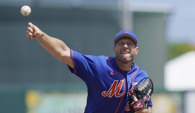 New York Mets&#x27; Max Scherzer pitches in the second inning of a spring training baseball game against the Miami Marlins, Monday, March 21, 2022, in Jupiter, Fl. (AP Photo/Sue Ogrocki) **FILE**