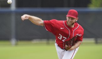Washington Nationals pitcher Stephen Strasburg throws live batting practice during the team&#x27;s spring training baseball workout, Tuesday, March 15, 2022, in West Palm Beach, Florida. (AP Photo/Sue Ogrocki) **FILE**