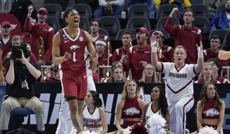 Arkansas guard JD Notae (1) celebrates during the second half of a college basketball game against Gonzaga in the Sweet 16 round of the NCAA tournament in San Francisco, Thursday, March 24, 2022. (AP Photo/Marcio Jose Sanchez)