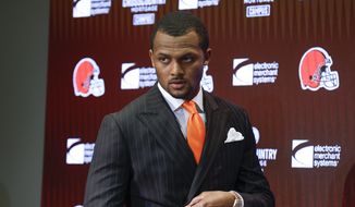 Cleveland Browns new quarterback Deshaun Watson enters a news conference at the NFL football team&#39;s training facility, Friday, March 25, 2022, in Berea, Ohio. (AP Photo/Ron Schwane) **FILE***