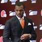 Cleveland Browns new quarterback Deshaun Watson enters a news conference at the NFL football team&#39;s training facility, Friday, March 25, 2022, in Berea, Ohio. (AP Photo/Ron Schwane) **FILE***
