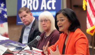 Seventh District Congresswoman Pramila Jayapal, right, speaks at a union roundtable focusing on how to strengthen unions across the United States, as U.S. Secretary of Labor, Marty Walsh, left, and U.S. Sen. Patty Murray, D-Wash., center, look on Friday, March 25, 2022, in Seattle. (Greg Gilbert/The Seattle Times via AP) **FILE**