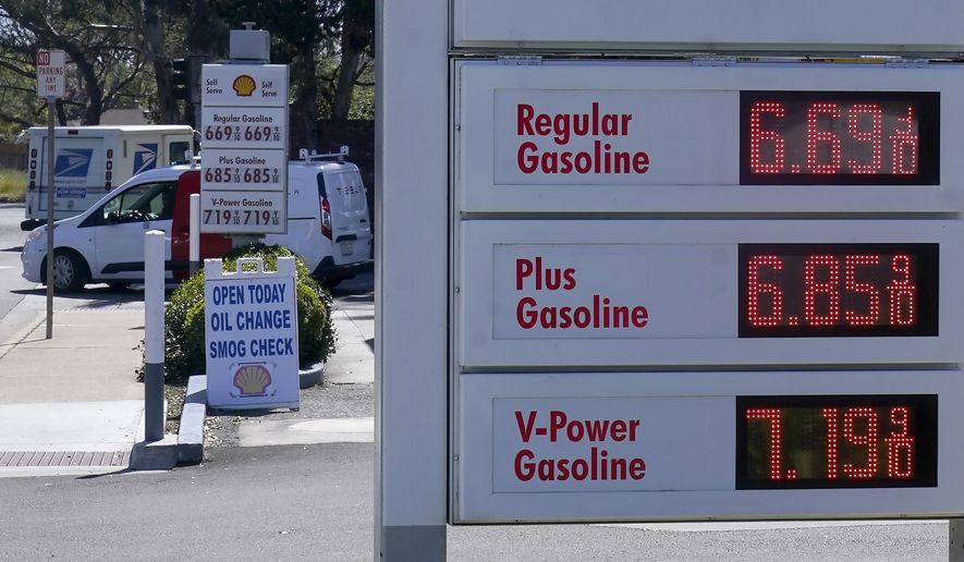 The gasoline price board is shown at a gas station in Menlo Park, Calif., March 21, 2022. A majority of Americans say they don&#x27;t blame President Joe Biden for high gasoline prices, but they&#x27;re giving his economic leadership low marks amid fears of inflation and deepening pessimism about economic conditions. (AP Photo/Jeff Chiu)