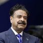 In this Sept. 24, 2017, photo, Jacksonville Jaguars owner Shahid Khan stands before an NFL football game against between the Jaguars and the Baltimore Ravens at Wembley Stadium in London. (AP Photo/Matt Dunham, File) **FILE**