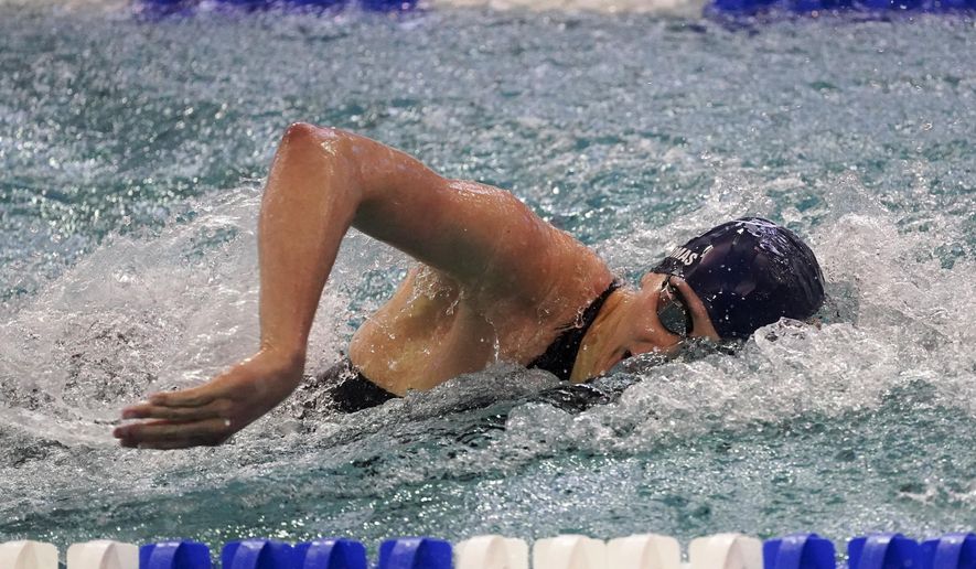 Pennsylvania&#x27;s Lia Thomas competes in the 200 freestyle finals at the NCAA Swimming and Diving Championships Friday, March 18, 2022, at Georgia Tech in Atlanta. (AP Photo/John Bazemore)