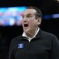 Duke head coach Mike Krzyzewski reacts toward players during the first half of his team&#39;s college basketball game against Arkansas in the Elite 8 round of the NCAA men&#39;s tournament in San Francisco, Saturday, March 26, 2022. (AP Photo/Tony Avelar)