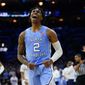 North Carolina&#x27;s Caleb Love reacts during the second half of a college basketball game against UCLA in the Sweet 16 round of the NCAA tournament, Friday, March 25, 2022, in Philadelphia. (AP Photo/Chris Szagola)