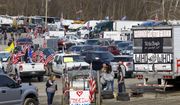 Truckers gather at Hagerstown Speedway as the People&#39;s Convoy makes preparations in this Saturday, March 5, 2022, file photo, in Hagerstown, Md. (AP Photo/Jon Elswick) ** FILE **
