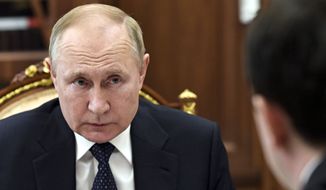 Russian President Vladimir Putin attends a meeting in Moscow, Russia, Tuesday, March 29, 2022. (Mikhail Klimentyev, Sputnik, Kremlin Pool Photo via AP) **FILE**