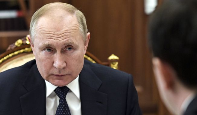 Russian President Vladimir Putin attends a meeting in Moscow, Russia, Tuesday, March 29, 2022. (Mikhail Klimentyev, Sputnik, Kremlin Pool Photo via AP) **FILE**