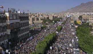 Houthi supporters attend a rally during the seventh anniversary of the Saudi-led coalition&#39;s intervention in Yemen&#39;s war in Sanaa, Yemen, Saturday, 26 March, 2022. (AP Photo/Abdulsalam Sharhan)