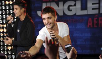 The Wanted&#39;s Tom Parker performs at Z100&#39;s Jingle Ball 2012 kickoff event in New York on Oct. 19, 2012. Parker died Wednesday, March 30, 2022, after being diagnosed with an inoperable brain tumor. He was 33. (Photo by Evan Agostini/Invision/AP, File)