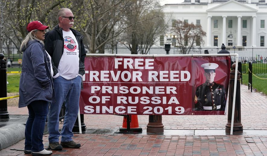 Joey and Paula Reed, parents of U.S. Marine Corps veteran and Russian prisoner Trevor Reed, stand in Lafayette Park near the White House, Wednesday, March 30, 2022, in Washington. The Reeds are urging President Joe Biden to advocate for their son&#39;s release from his nine-year prison term on charges alleging that he assaulted police officers in Moscow. (AP Photo/Patrick Semansky)