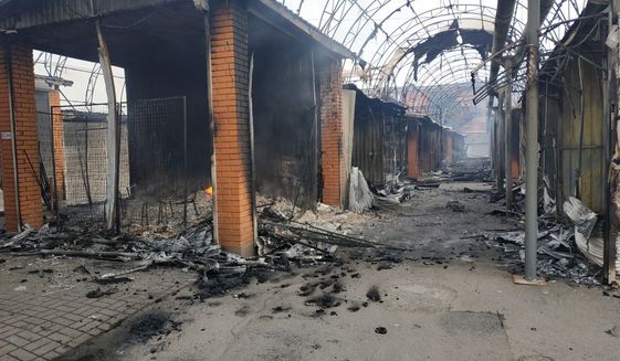 The city market is seen damaged by night shelling in Chernihiv, Ukraine, Wednesday, March 30, 2022. Ukrainian officials say Russian forces pounded areas around Kyiv and another Ukrainian city overnight. The attacks come hours after Moscow pledged to scale back military operations in those places. (AP Photo/Vladislav Savenok)