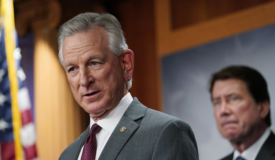 Sen. Tommy Tuberville, R-Ala., left, listens to reporters&#x27; questions during a news conference about the U.S. southern border, Wednesday, March 30, 2022, in Washington. (AP Photo/Mariam Zuhaib) ** FILE **