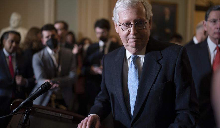Senate Minority Leader Mitch McConnell, R-Ky., finishes speaking with reporters about President Joe Biden&#39;s proposed $5.8 trillion budget, at the Capitol in Washington, Tuesday, March 29, 2022. (AP Photo/J. Scott Applewhite)
