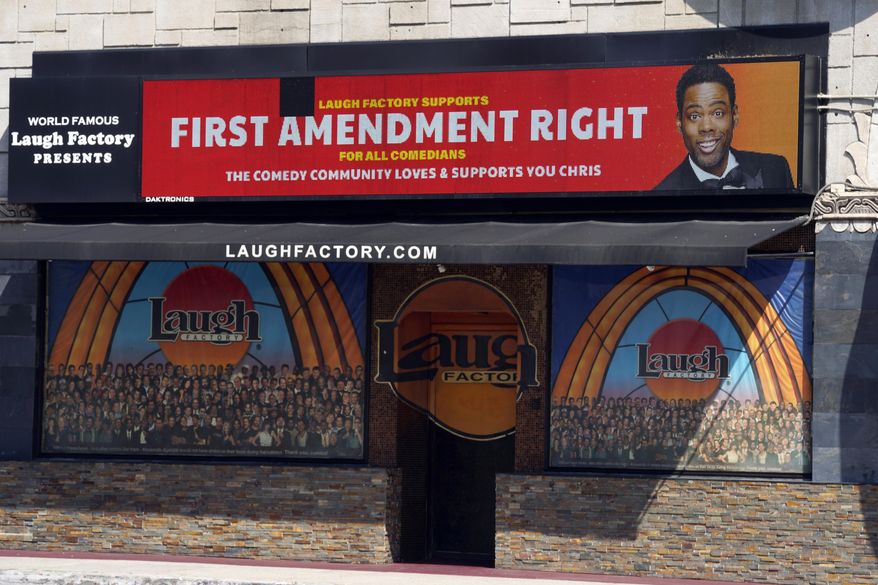 A message expressing support for comedian Chris Rock is displayed on the digital marquee of the Laugh Factory comedy club, Wednesday, March 30, 2022, in Los Angeles. Rock was slapped onstage by best actor winner Will Smith after making a joke about Smith&#39;s wife Jada Pinkett Smith during Sunday night&#39;s Academy Awards telecast. (AP Photo/Chris Pizzello)