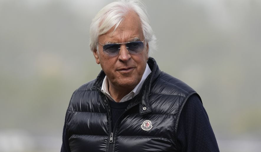 FILE - Trainer Bob Baffert waits for the Breeders&#x27; Cup horse races at Del Mar racetrack in Del Mar, Calif., Nov. 5, 2021. The Kentucky Court of Appeals on Friday, April 1, rejected Bafferts motion for emergency relief from a 90-day suspension. As a result of the order signed by Acting Chief Judge Allison Jones, the Hall of Fame trainers suspension is scheduled to begin Monday. (AP Photo/Jae C. Hong, File)